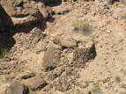 More structures below the cliff